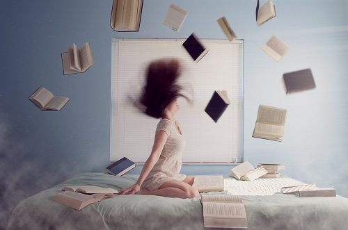 Books flung into air - Goodreads image