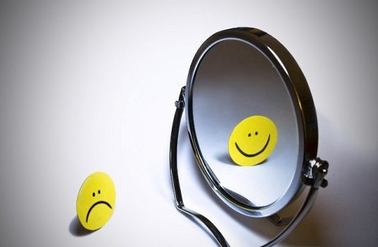 Mirror of Smiling Frowning emoji
